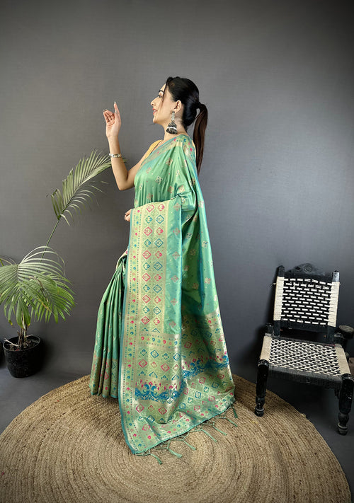 Dista Elora Sea Green Soft Silk Geometric Zari Woven Patola Saree