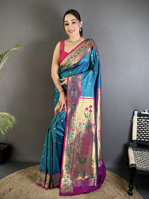 Dista Elora Teal Blue Lichi Silk Ikkat Floral Motifs Zari Woven Paithani Saree
