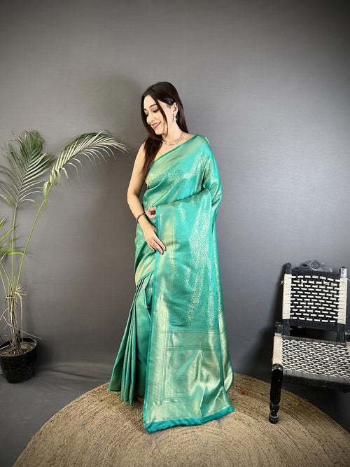 Dista Elora Teal Satin Silk Floral Motifs & Ethnic Silver Zari Design Kanchipuram Saree