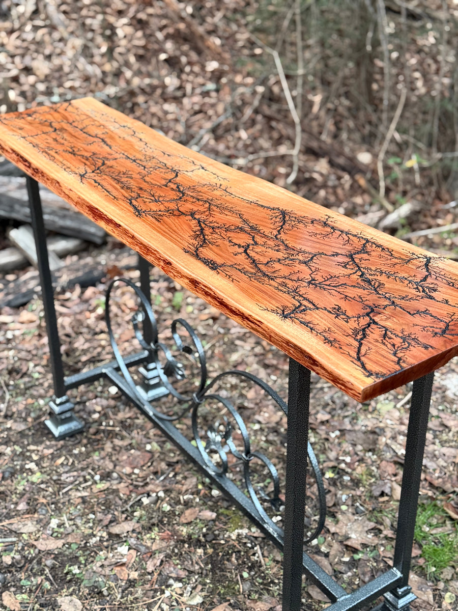 Foxcreek Baskets Console Table- Fractal Burn Patagonian Rosewood with Live edge and metal powder coated frame with scrollwork