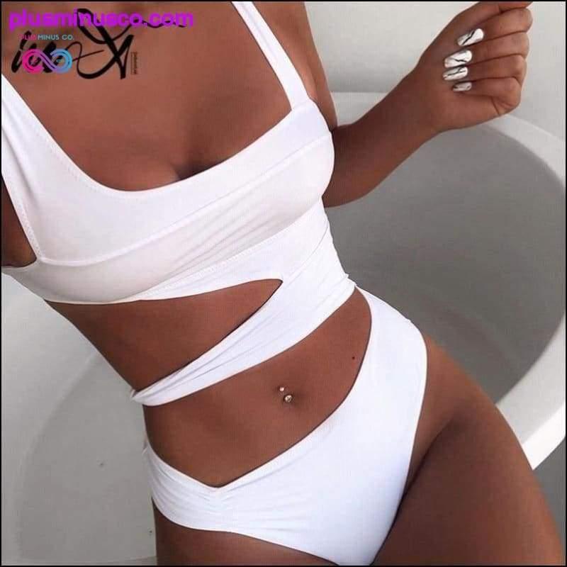 Plus Minus Co In-X Hollow out swimsuit one piece Sexy white Padded